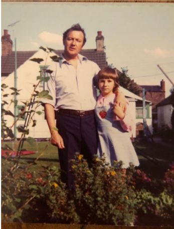 Tonia and her dad in the garden of 193 Main Street